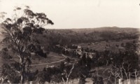 A long distance view of the Cotter and Murrumbidgee Rivers north from Bullen Range showing the bridge over the Murrumbidgee River and the Cotter Pumping Station.