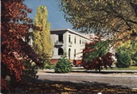 East Block from across Queen Victoria Terrace. Text on the back reads: Autumn foliage. East Block Secretariat housing government departments of Commerce, Customs and General Post Office.