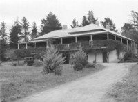 Front view of Lambrigg from the north east with a car (circa 1930s) parked in the driveway