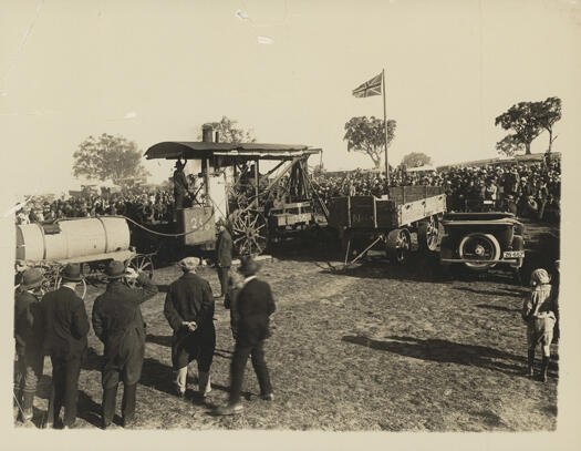 Turning of the first sod for the construction of the provisional Parliament House, with a large crowd watching