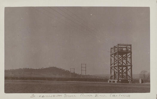 Power House transmission towers, Kingston, shows power lines going off into the distance.