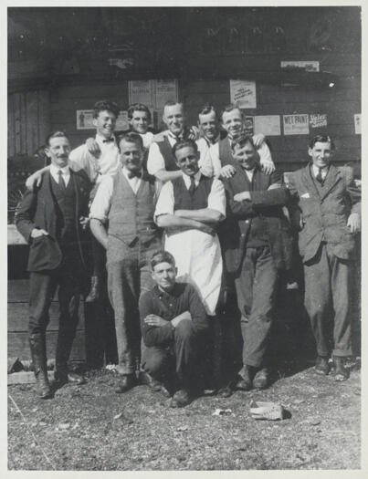 Canberra Co-op Store staff. 

Back row: M. Campbell, Eugene De Smet, J Gallagher, Dave Pegram,  Keith Carnall. 

Front row: E. Paynting, Jack Esmond, Bob Shannon, Phil Corkhill, Norman Reid.

Kneeling: Jack Cotterill