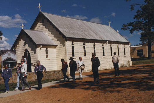 CDHS excursion to Tuggeranong. People leaving the Sacred Heart Catholic church, Calwell, now St Francis of Assisi.