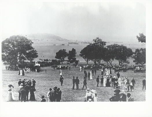 Commencement ceremony on 12 March 1913 - view past the crowd and mounted troops to Duntroon and Mt Ainslie