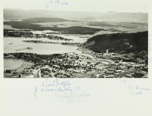 Aerial view of the Australian National University. Mt. Stromlo can be seen in the distance, with Black Mountain in the left, middle distance.