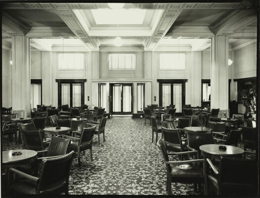 An interior view of the Hotel Canberra showing the lounge, bar area and dining area.