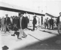 Construction workers leaving work after their shift was completed. Site is unknown.