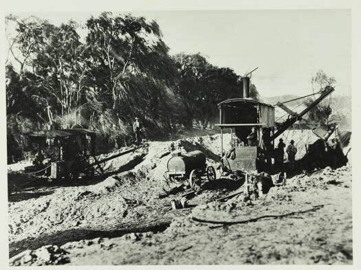 Shows some of the machinery used in road construction during the 1920s.