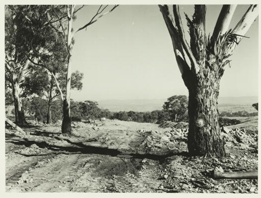 The Federal Highway under construction between Canberra and Goulburn. The road opened in 1938. It was constructed as part of an unemployment relief program due to the Depression.