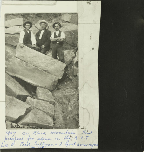 Fred Sullivan at a quarry on Black Mountain with two government surveyors. The quarry was the first prospect for supplying stone for a national capital.