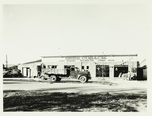 A front view of Greg Cusack's service station, Flinders Way in Manuka. He sold Chrysler and Plymouth vehicles.