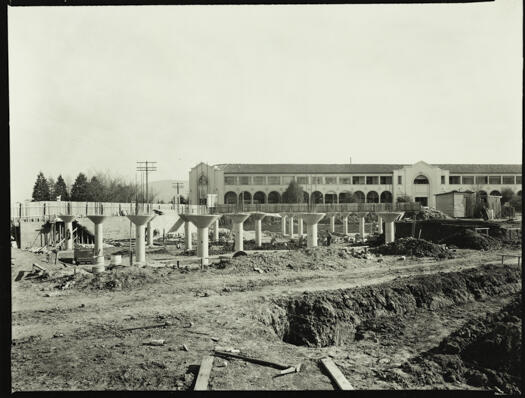 Civic under construction showing the building housing the Bailey Arcade on the corner of London Circuit between East Row and Petrie Street.