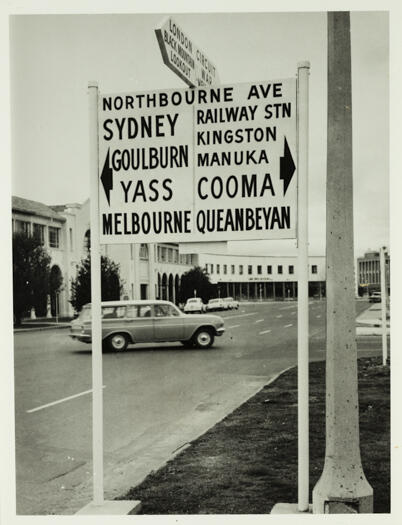 Universal sign post on the corner of London Circuit and Northbourne Avenue, Civic