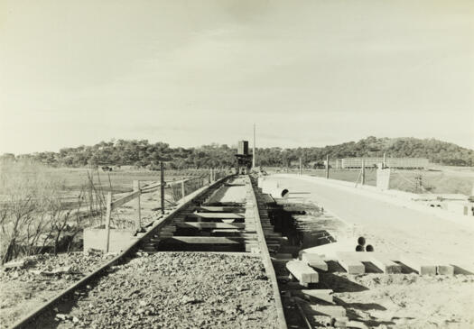 Kings Avenue Bridge under construction. Shows the rail track which carried concrete beams for the bridge.