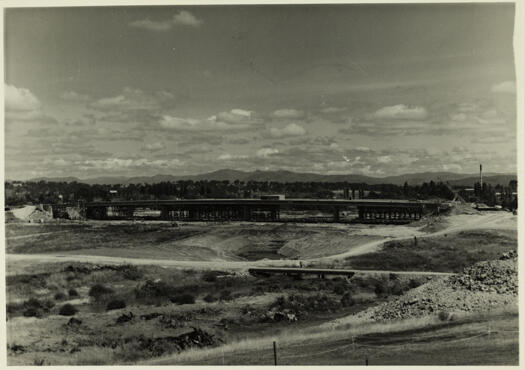 View from the north east of Commonwealth Avenue Bridge under construction, showing form work.