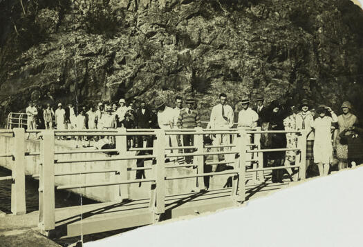 Cotter Dam walkway showing visitors inspecting the dam.