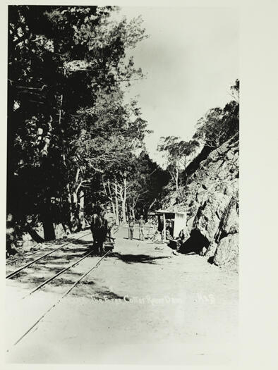 Cotter Dam - forge at the dam construction abput 100 yards below the dam wall. Photo shows a horse pulling a trolley along a tram line.