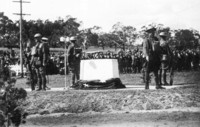 The ceremony of unveiling the commemoration stone of the Australian War Memorial was held on Anzac Day 1929. A catafalque party guards each corner of the commemoration stone.
