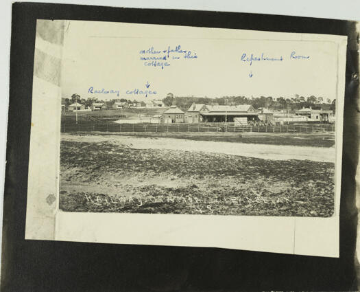 Shows the Queanbeyan Railway Station and railway cottages