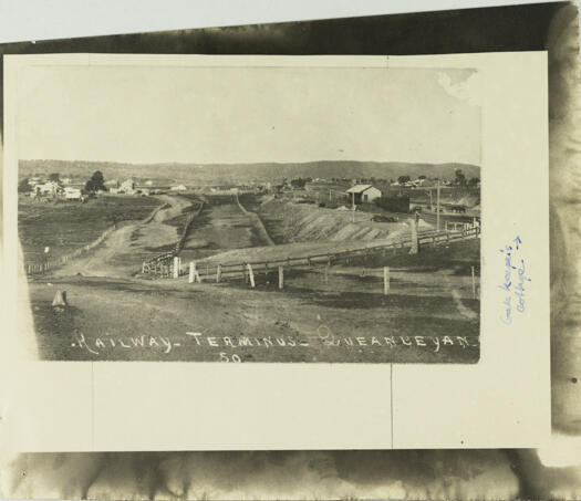 Queanbeyan Railway Station with a few scattered houses in the background