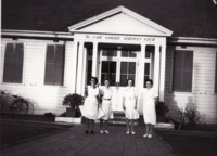 Shows the entrance to the Lady Gowrie Services Club (at Manuka) and four lady volunteers