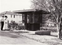 Police guard box at the front of the Soviet Embassy, Canberra Avenue, Griffith. A policeman is standing guard.