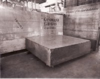 Packing cases and a large block of concrete - part of the \"Command of the Seas\" exhibition.