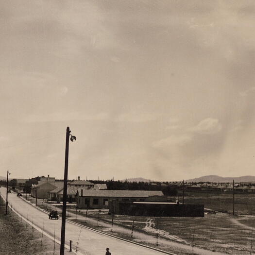Braddon, probably Mort Street, showing the Canberra Steam Laundry on the right hand side. Northbourne Avenue is on the left hand side.