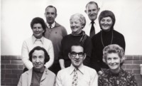 Lyneham High School, \"Between the Lynes\" school magazine photo of eight staff members