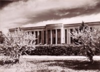 Institute of Anatomy, McCoy Circuit, Acton. Trees are in blossom in front of the building.