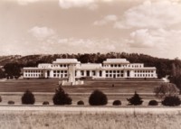 Parliament House with the King George V statue in front, taken from Cork Hill