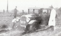 Commonwealth car and driver in the mud