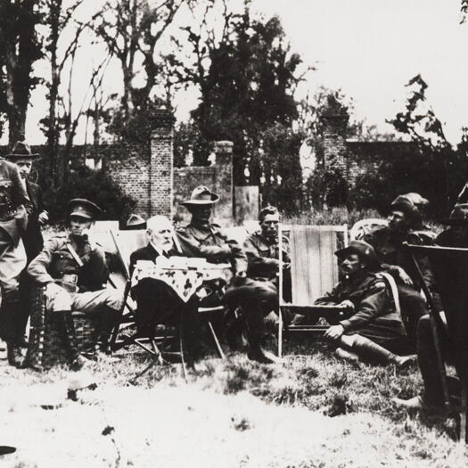 Billy Hughes talks to diggers of the Graves Registration Detachment at Villers-Bretonneux