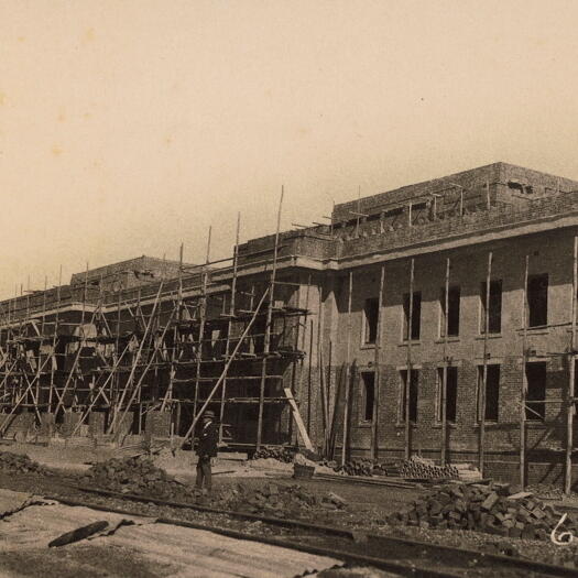 Parliament House under construction - front showing railway line