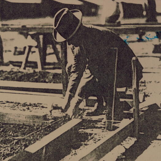 Sir John Butters hammering the first nail for the start of construction of the Causeway Hall on 28 November 1925. The hall was opened on 6 February 1926.
