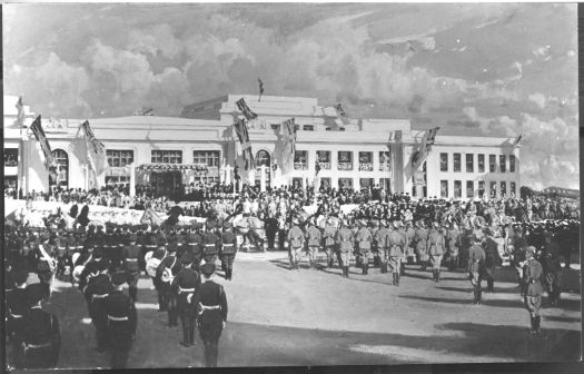 Parliament House - opening day on 9 May 1927 showing parading troops. View is from the rear of the troops looking towards Parliament House.