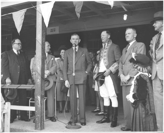 CS Daley addressing the Highland gathering at Manuka. The event was run by the Scottish community of Canberra.