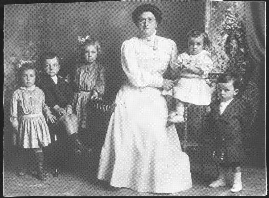 Miss Annie Duddle with five of her young nieces and nephews.