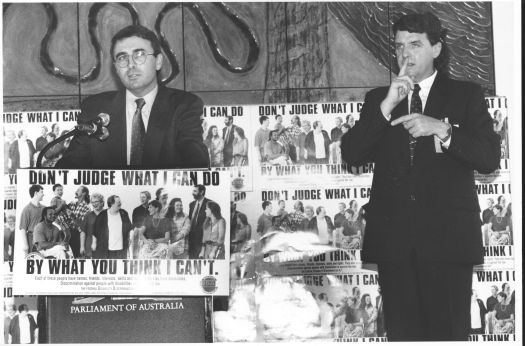 National Awareness Campaign for Disability - Michael Lavarch MHR speaking while an unnamed man translates into sign language