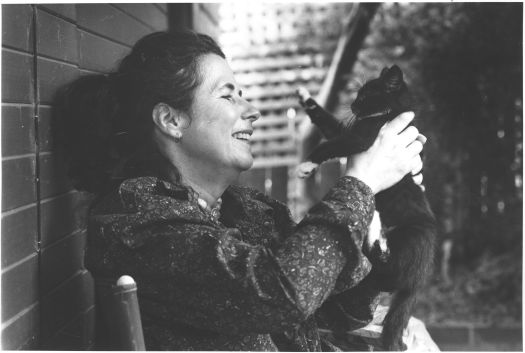Sara Dowse, author, in O'Connor with her cat
