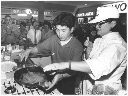 Japanese exchange butcher, Yasvo Koizumi giving a demonstration of Japanese cooking at the Tuggeranong Hyperdome