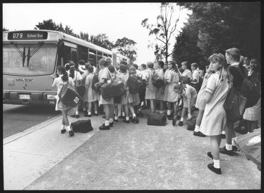 Students at St Clares and St Edmunds boarding a bus