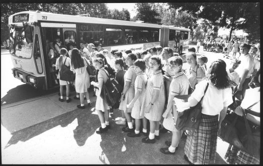 Students at St Clares and St Edmunds boarding a bus