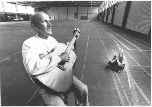 Folk festival director tests acoustics