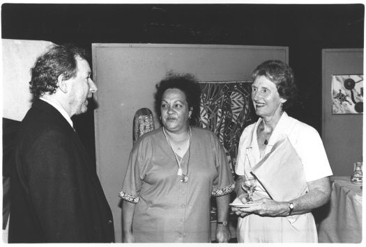 Council Chambers, Queanbeyan showing a man talking to two women