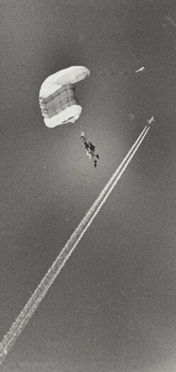 Crowded skies over Canberra - jets and dual skydivers