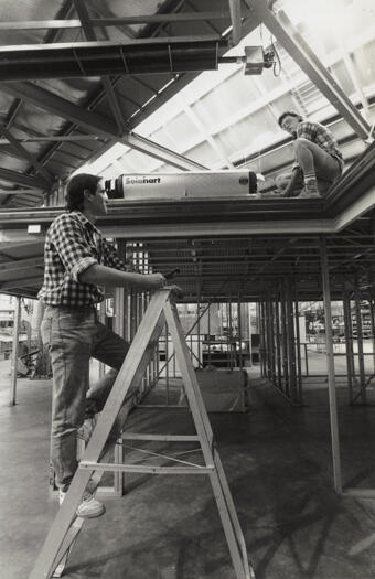 Plumbing apprentices training on steel house