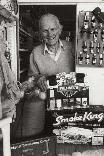 Mick O'Brien in sports & barber shop, The Lawns, Manuka