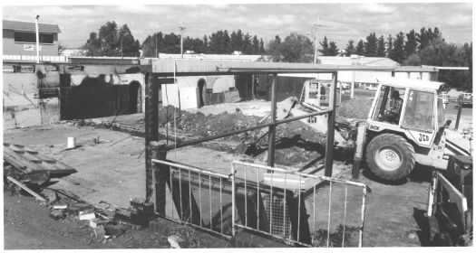 Fyshwick Tavern, on the corner of Barrier and Ipswich Streets, being demolished. The Harvey Norman store is in the background.