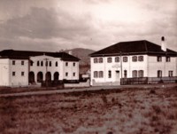 Photo shows St. Christopher's convent and school with Mt. Mugga Mugga in the distance.